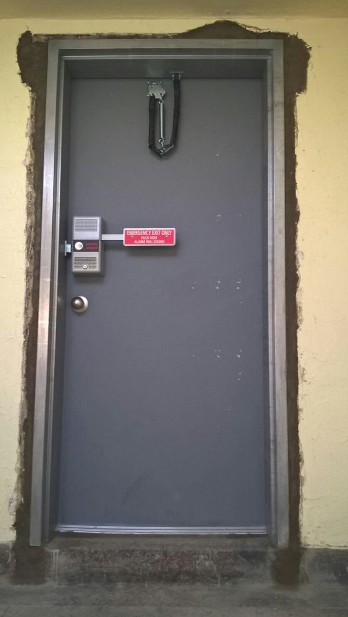 Exit door alarm lock